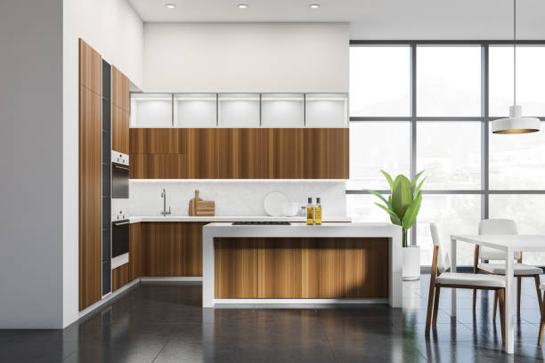 istock White and wooden kitchen set interior with dining table and chairs, window 1373425852
