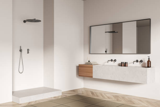 istock Modern bathroom interior with ceramic double sink, mirror, shower. White walls, hardwood flooring. 3d rendering. 1373431901