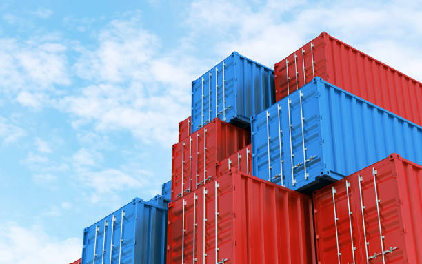 istock Red and blue shipping container under blue sky stacks stock photo 1373433515