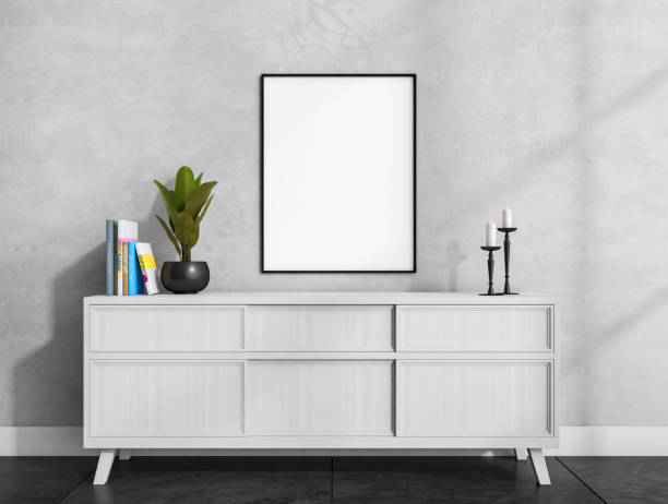 istock Bright living room interior with empty white poster, sideboard 1373436691