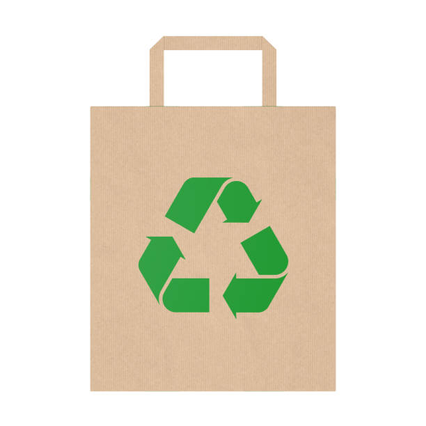 Shopping Paper Bag with Green Recycle Sign on a white background. 3d Rendering