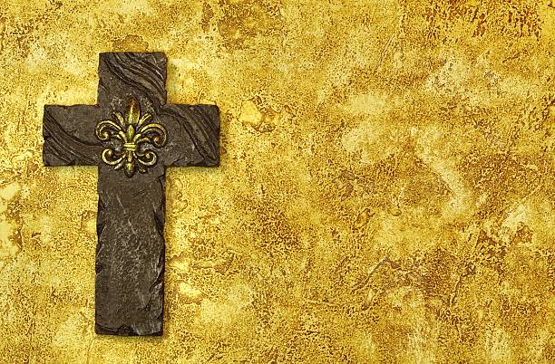 istock Cross on Gold Brown Textured Background 137344629
