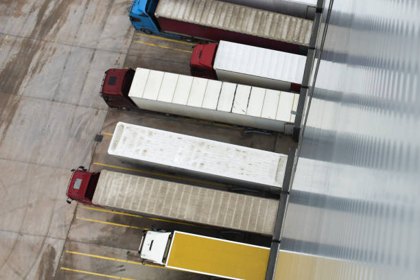 istock Semi Trucks at Warehouse, Aerial View 1373462894