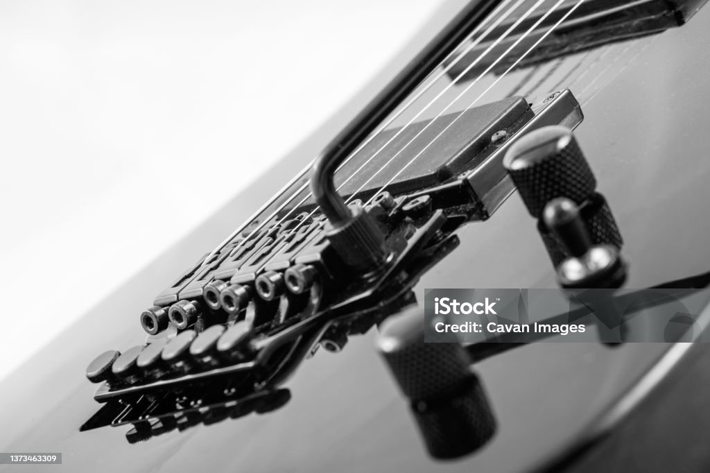 Detail of a Heavy Metal Rock Guitar Detail of a Heavy Metal Rock Guitar in Marsaskala, Malta Black And White Stock Photo