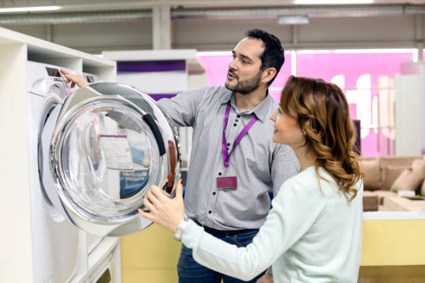 Buying a new washing machine stock photo