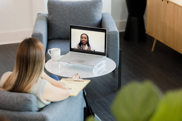 istock High angle view unrecognizable woman in virtual meeting with client 1373476294
