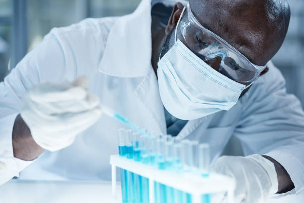 istock Medical researcher working with samples in flasks 1373476814