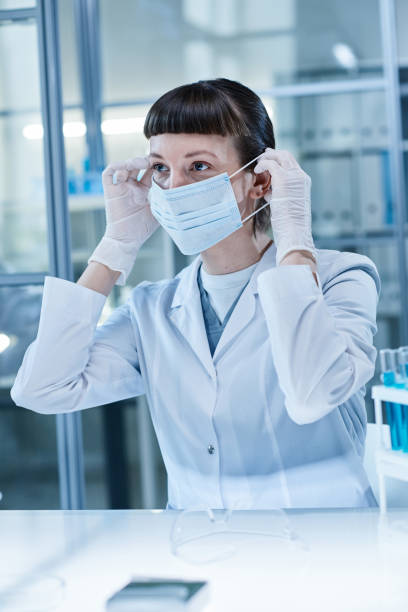 istock Scientist working in protective wear in lab 1373476838