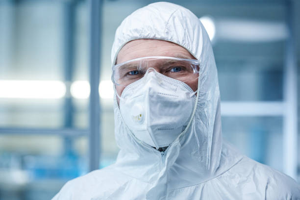 istock Doctor working in protective wear in laboratory 1373478385
