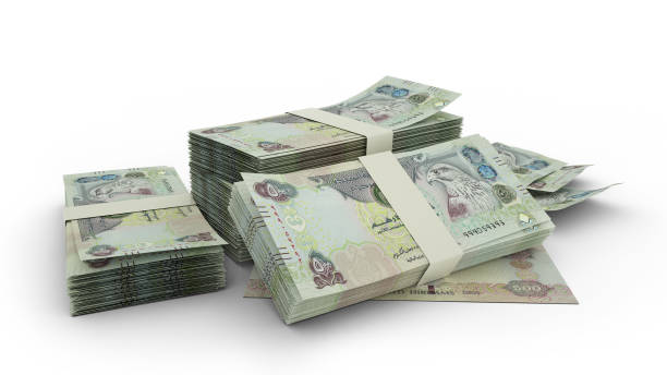 istock 3d rendering of Stack of United Arab Emirates dirham notes. bundles of UAE currency notes isolated on white background 1373496475