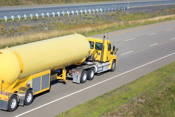 Semi propane tanker truck delivering its load.