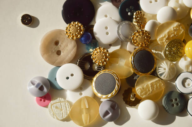 istock buttons for clothes. the clasp. needlework items. background for the design. 1373524538