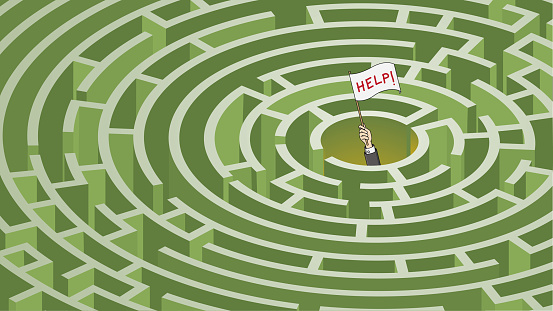A lost businessman in a complex labyrinth holding a Help written white flag. All design elements are on separate layers.