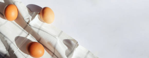 istock Easter eggs lay on towel banner 1373540993
