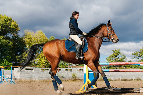 istock young girl riding a horse 137355047