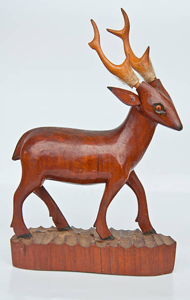 istock The model of deer from wood on white background 137356390