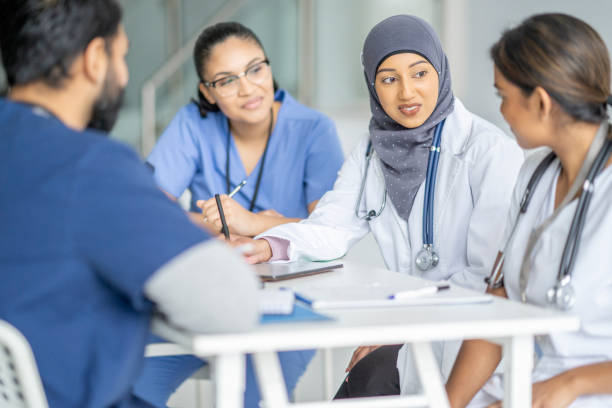 istock Nursing Staff Team Meeting 1373570758