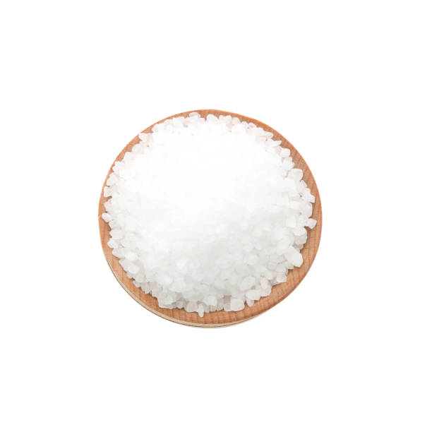 istock Natural salt in bowl on white background, top view 1373598015