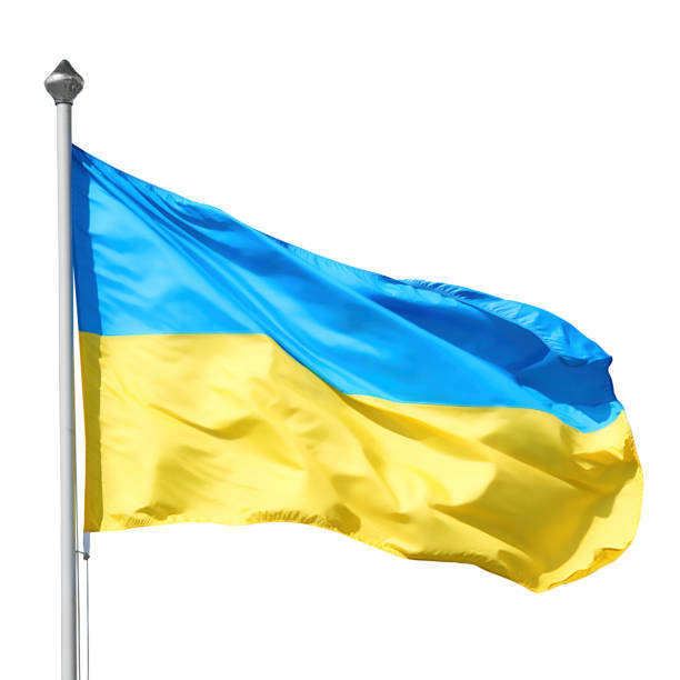 istock Ukrainian flag on flagpole isolated with clipping path 1373603285