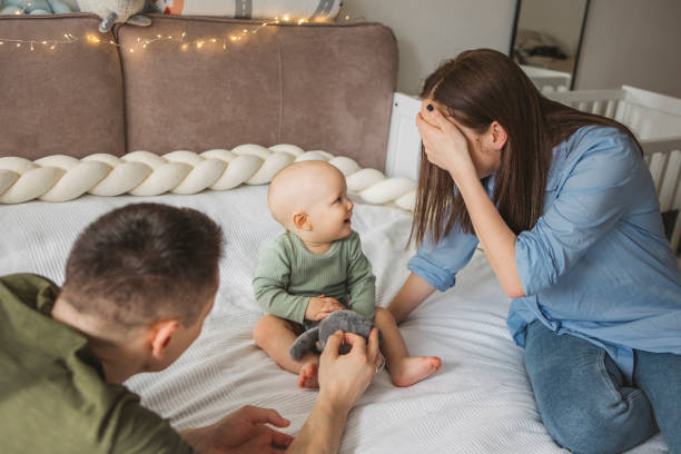 istock Young family at home 1373626520