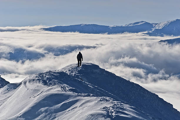 istock climbing the mountain in winter 137372744