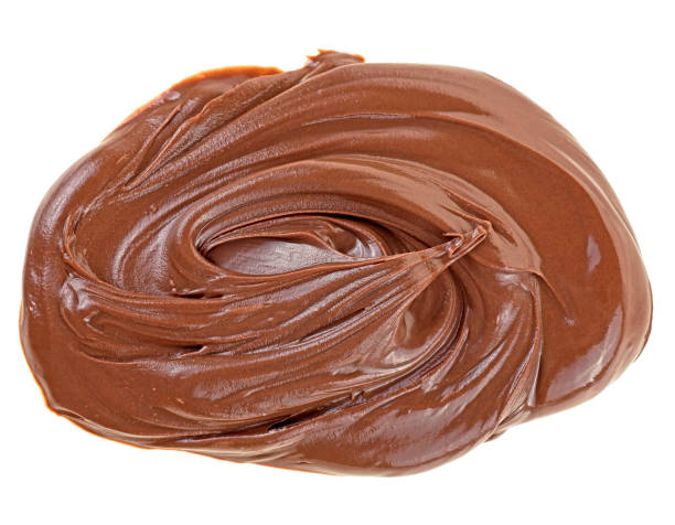 istock Chocolate spread isolated on a white background. Chocolate cream butter. 1373728051