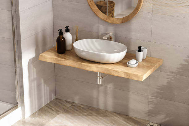 istock White sink standing on a wooden shelf. 1373730256