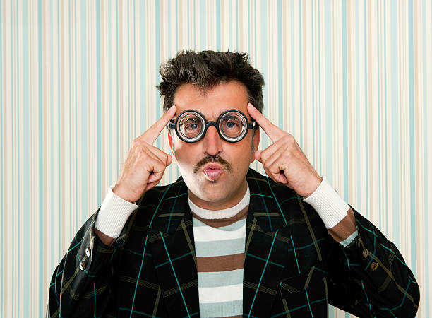 istock nerd silly crazy myopic glasses man funny gesture 137374078