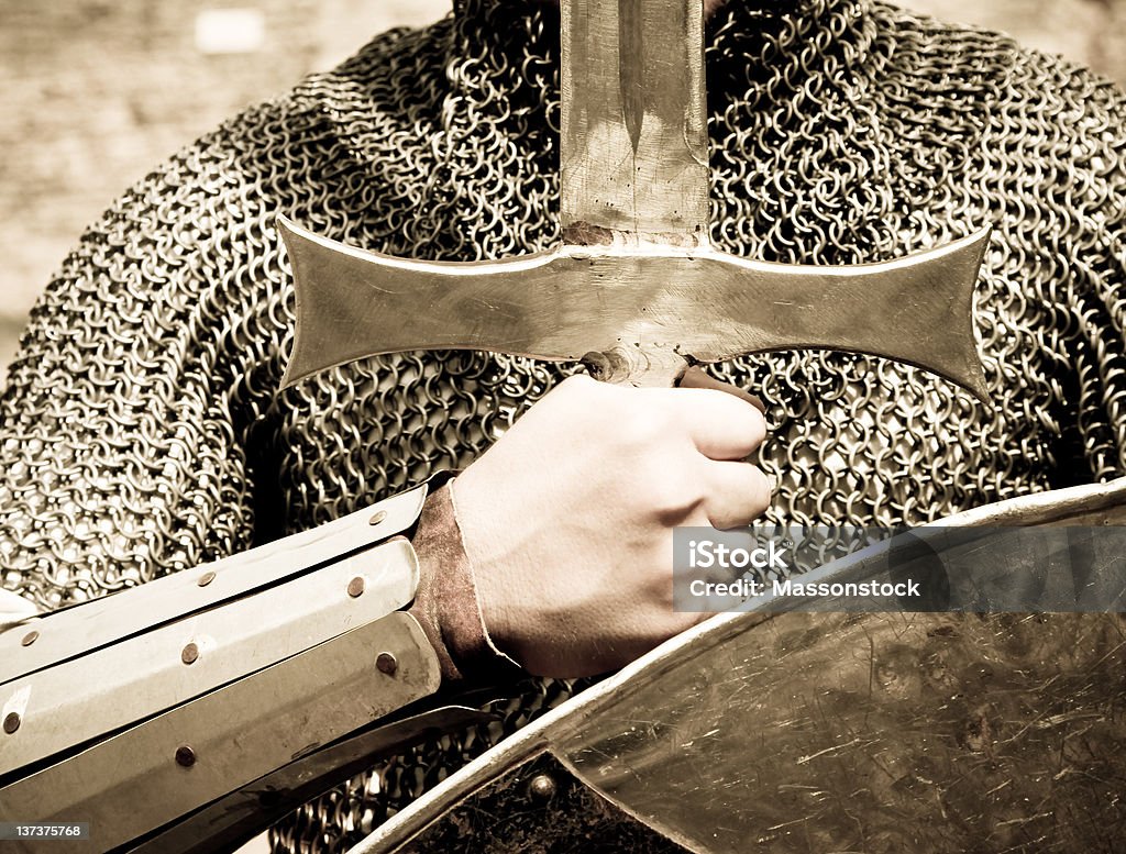 Knight with sword and shield  http://farm7.static.flickr.com/6211/6294982183_5743823218.jpg  Shielding Stock Photo