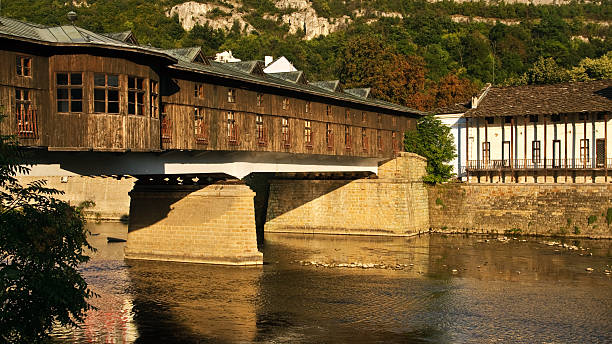 Pokrit most, covered footbridge in Lovech, Bulgaria Built in 1872 by famous Bulgarian architect Kolyu Ficheto, it is the only such bridge in the Balkan Peninsula. bulgarian culture bulgaria bridge river stock pictures, royalty-free photos & images