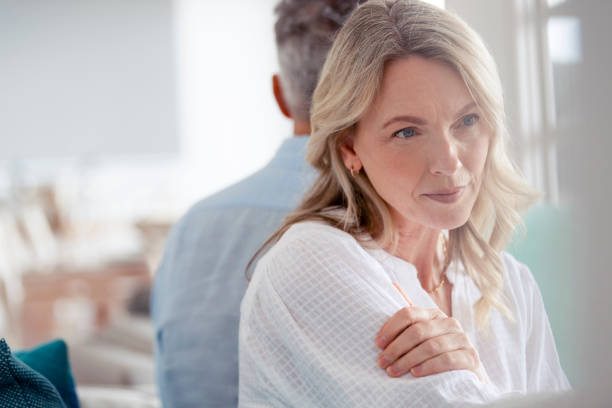 istock Mature couple fighting at home sitting on the sofa. 1373763458