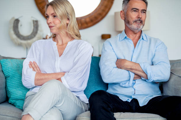 istock Mature couple fighting at home sitting on the sofa 1373763467