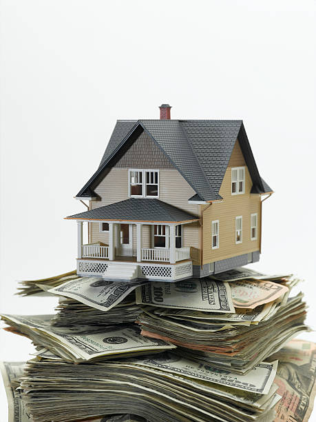 Home Prices The rising cost of home prices. stack rock stock pictures, royalty-free photos & images