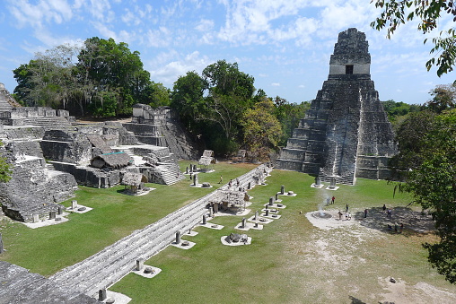 Tikal is an ancient Mayan citadel in the rainforests of northern Guatemala. Possibly dating to the 1st century A.D., Tikal flourished between 200 and 850 A.D. and was later abandoned. Its iconic ruins of temples and palaces include the giant, ceremonial Lost World (Mundo Perdido) Pyramid and the Temple of the Grand Jaguar. At 70 meters, Temple IV is the tallest pre-Columbian structure in the Americas.