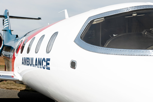 medevac air ambulance jet airplane in close-up on airfield (XXL)
