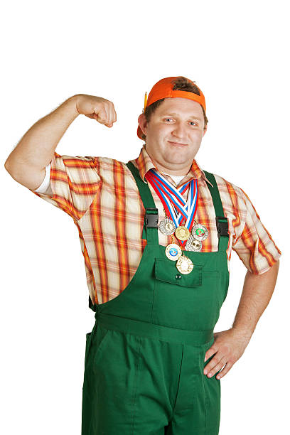 Young worker in green overalls
