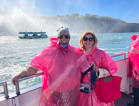 A senior couple enjoying touring Niagara Falls