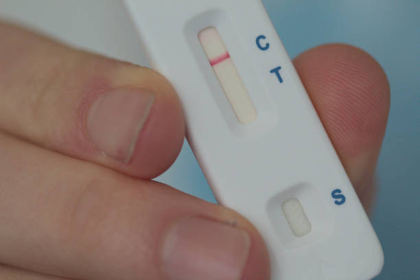 istock Self test covid sars-cov-2 negative in a hand (it's negative) 1373805665