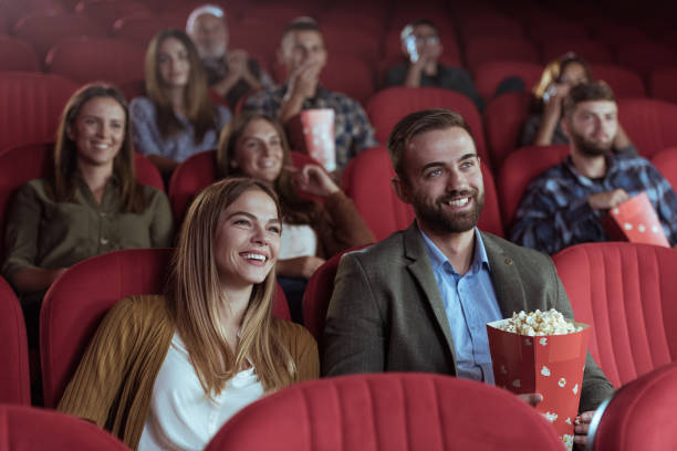 Young couple in cinema stock photo