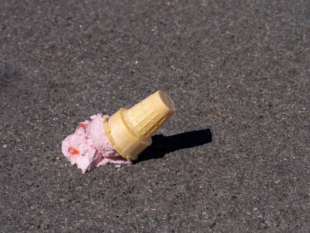istock Dropped Strawberry ice cream cone 1373841910