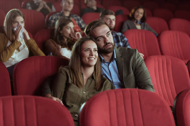 istock Happy couple in cinema 1373851957