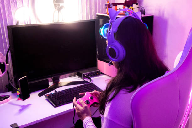 istock Female gamer at home 1373853544
