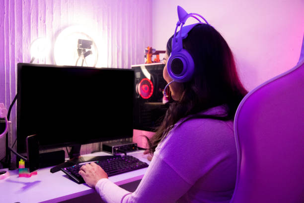 istock Female gamer at home 1373856674