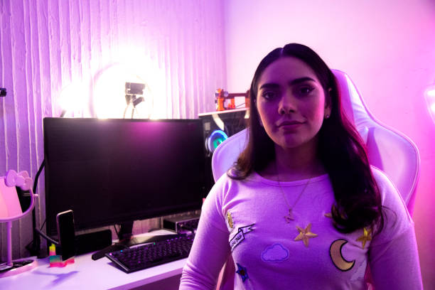 istock Female gamer at home 1373858225