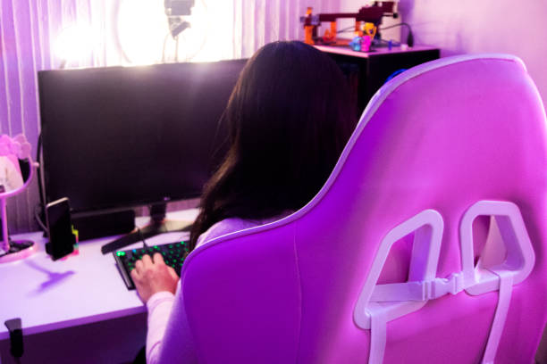 istock Female gamer at home 1373858231