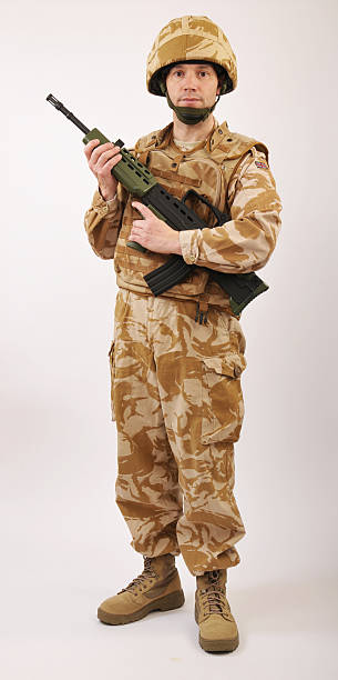 istock Desert Soldier With Rifle 137386400