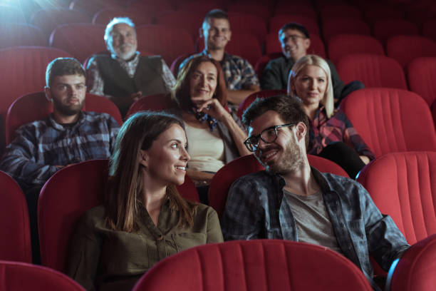 istock Happy couple in cinema 1373869776