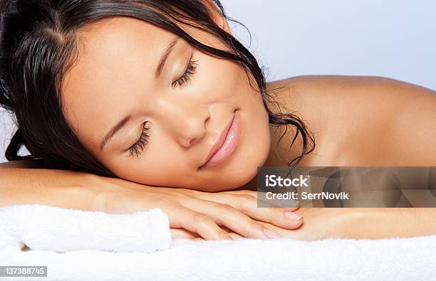 Girl Sleeping On The Towel Stock Photo - Download Image Now - Wet Hair, Sleeping, Adult