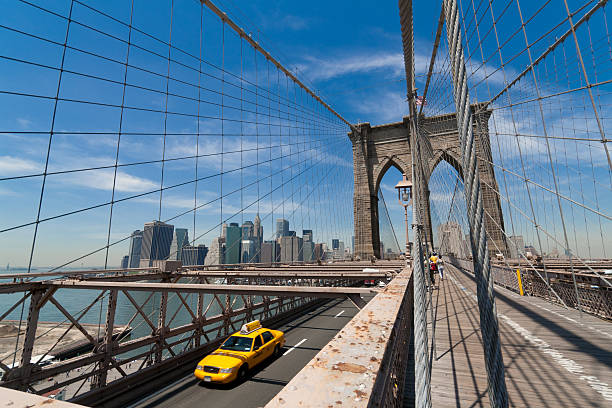 istock Brooklyn bridge with taxi driving 137389628