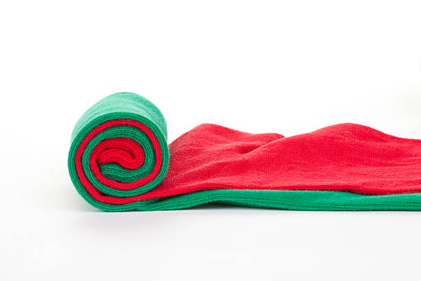 One green and red colorful textile fabric roll, isolated on white